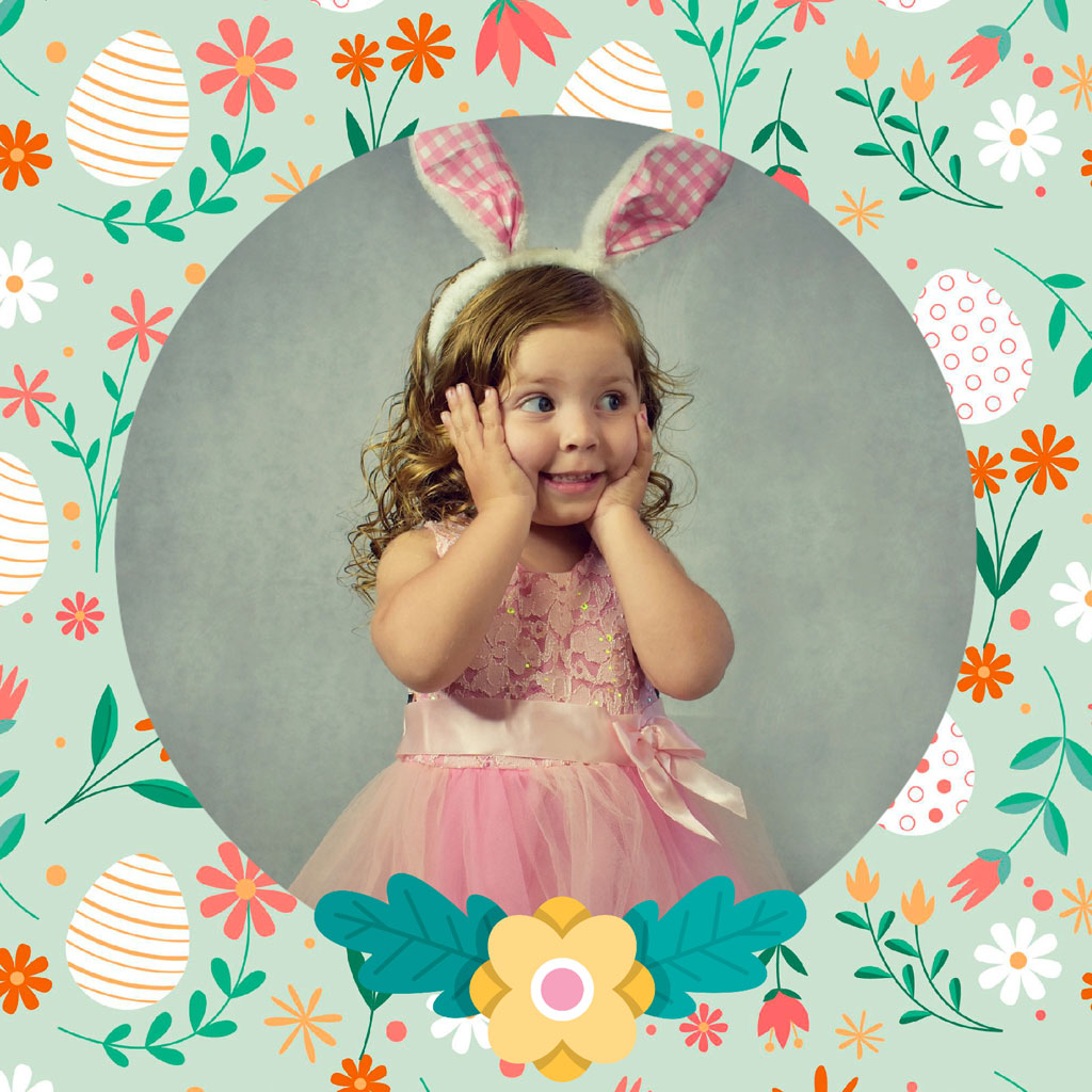 Little girl in pink dress and bunny ears