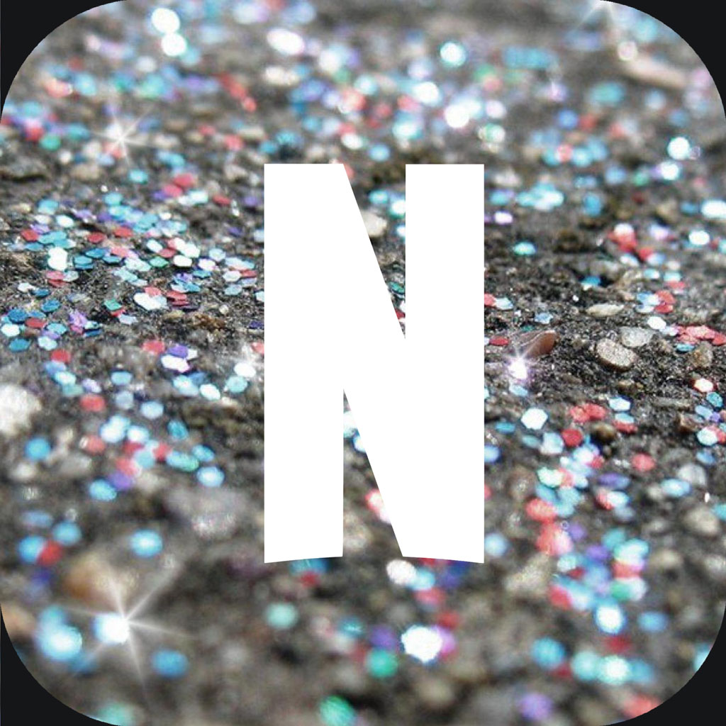 Large white letter N on a multicolored glittery surface