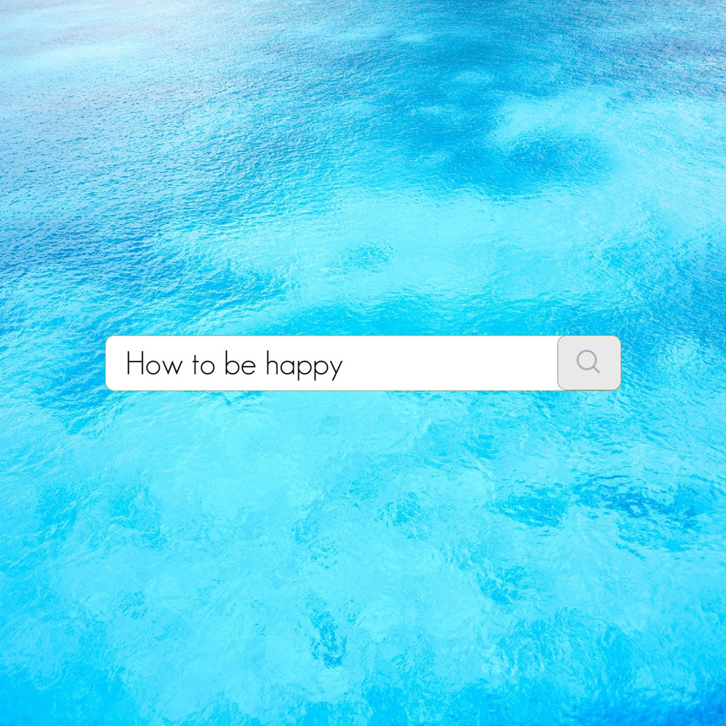 Search bar with 'How to be happy' query on a serene ocean background
