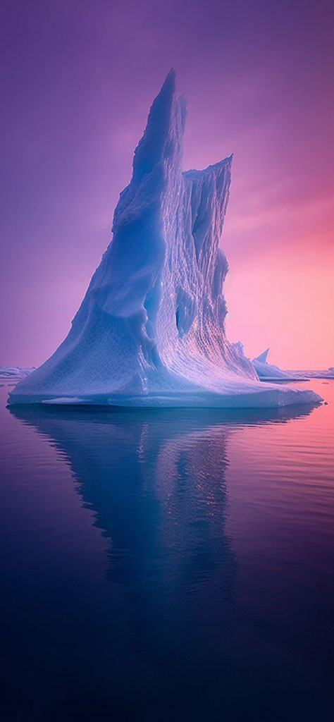 Iceberg in water with purple and pink sky