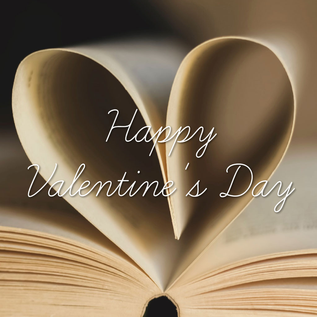 Open book with heart-shaped pages and 'Happy Valentine's Day' text