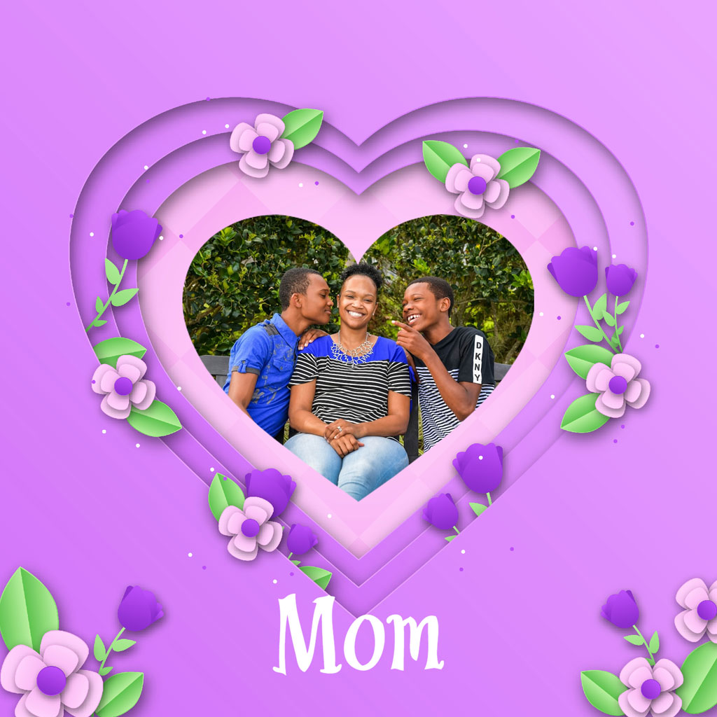 A family photo of a mother with her two sons inside a heart-shaped frame decorated with flowers.